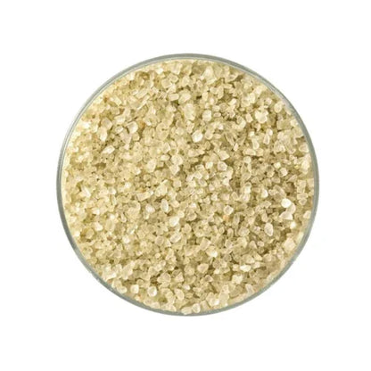 Close-up of natural bamboo jade sea salt crystals in a glass bowl