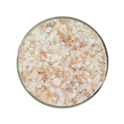 Bowl of coarse pink Himalayan salt crystals viewed from above