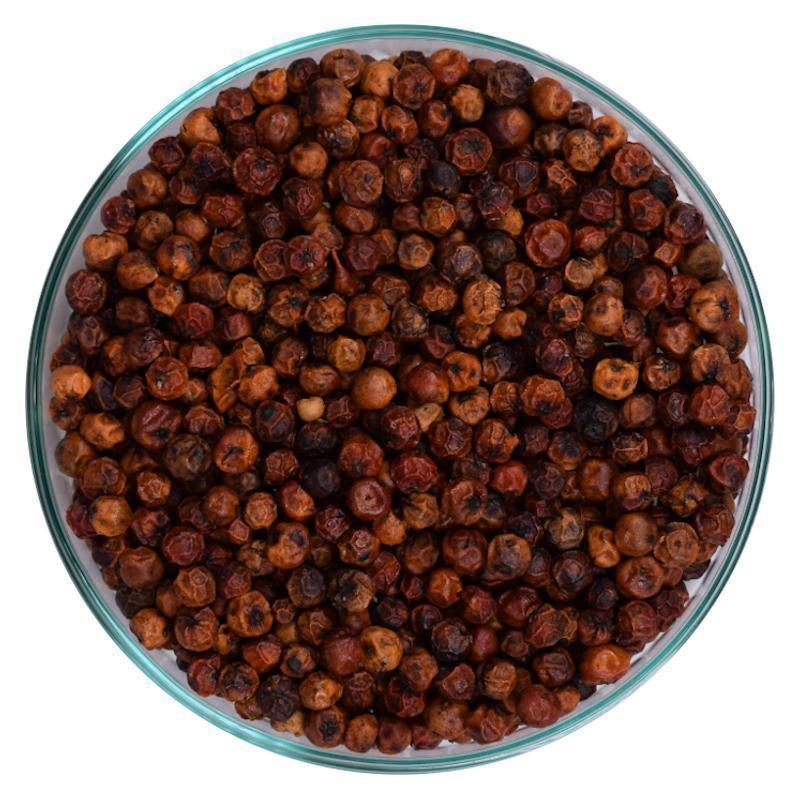 Bowl of whole red Kampot peppercorns, premium spice from Spice n Slice Market
