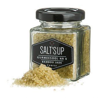 Jar of Salt's Up Bamboo Jade coarse gourmet salt with spilled crystals, premium spice market product