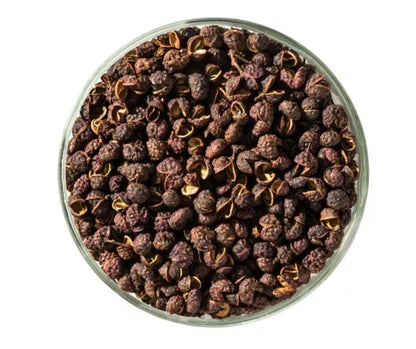 Glass bowl filled with whole PGI Kampot peppercorns from Spice n Slice Market