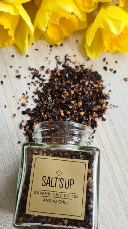 Salt's Up Ancho Chili gourmet chili flakes in glass jar with yellow flowers, Spice n Slice Market