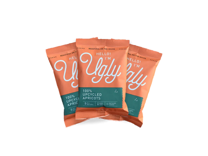 Three orange packs of 100% upcycled dried apricots, all natural and non-GMO snack.