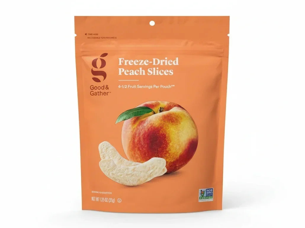 Bag of freeze-dried peach slices with peach image and Non-GMO label on orange packaging