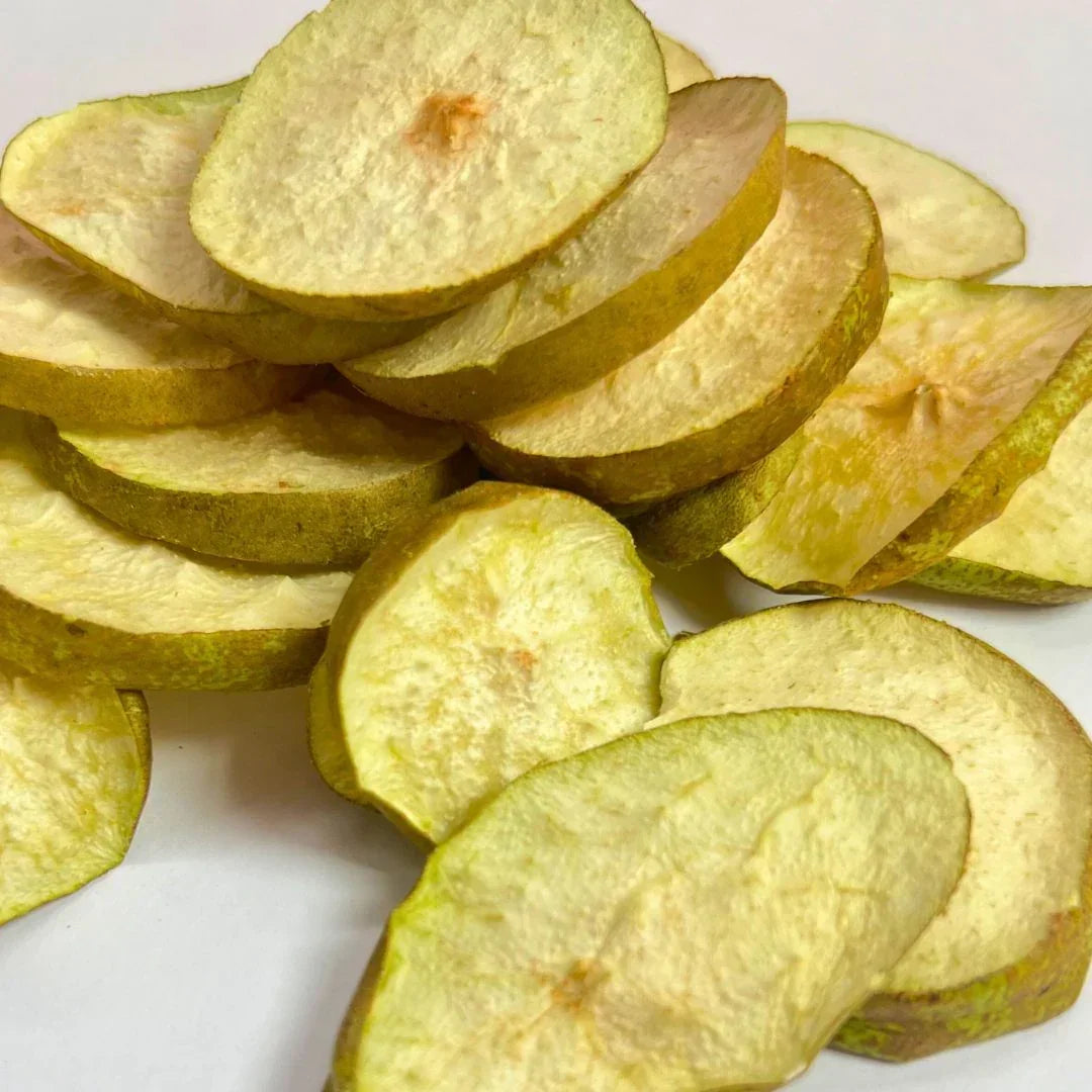 Freeze-dried pear slices healthy snack on white background, ideal for smoothies or on-the-go