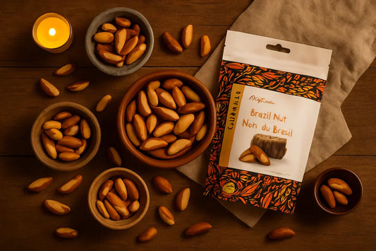 Brazil nuts in bowls and a colorful Brazil nut snack package on a wooden table