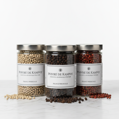 Kampot pepper trio 1kg bundle black white red peppercorns in three glass jars on marble surface