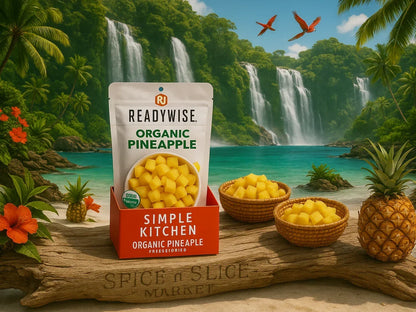 Organic pineapple freeze-dried snack pouch with diced pineapple, tropical beach and waterfalls.